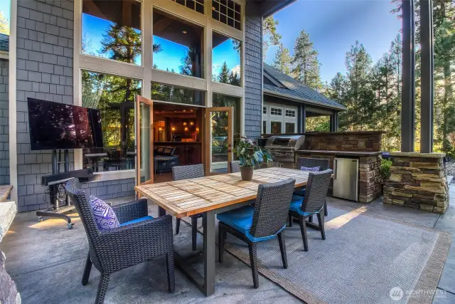 Spacious covered patio can host table that seats 12-14, an entertainer's dream coupled with the ability to do year round soirees.