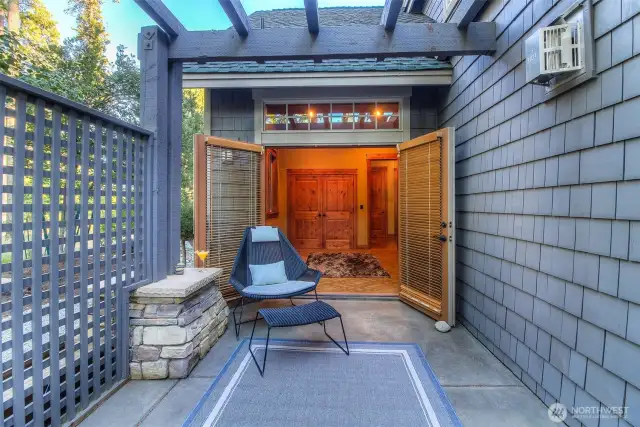 Terrace patio off second bedroom, guest suite or office has enclosed fencing from the french doors