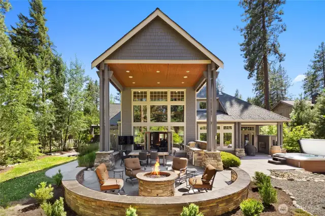The perfect symmetry of landscaping, architecture surrounds the 3 back patios that total more than 1250 sq ft