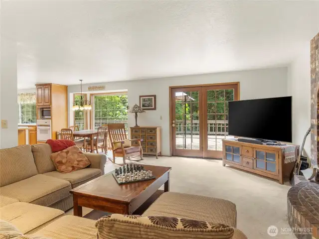 Family room with access to the spacious deck.