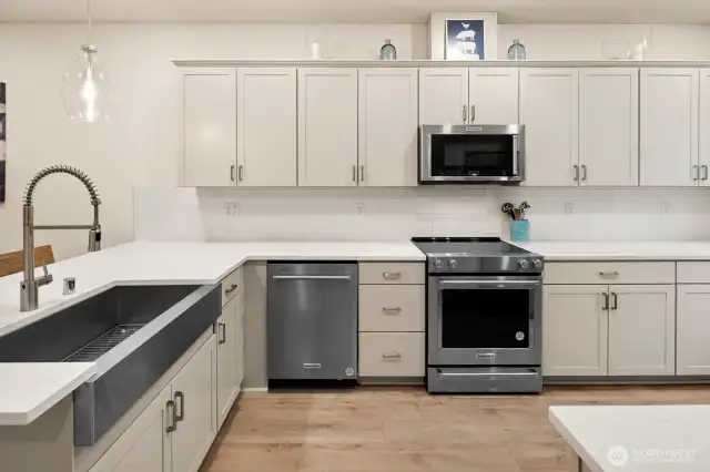 Open concept living/dining/kitchen- high ceilings, AC & tons of natural light