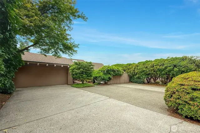 Expansive driveway with parking for 5+ cars