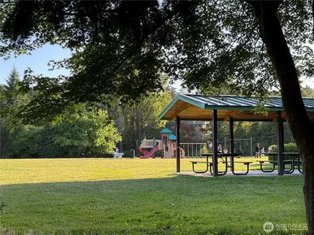 Lively Riverton Park with with playground,Covered picnic area, and community gardens within a block.