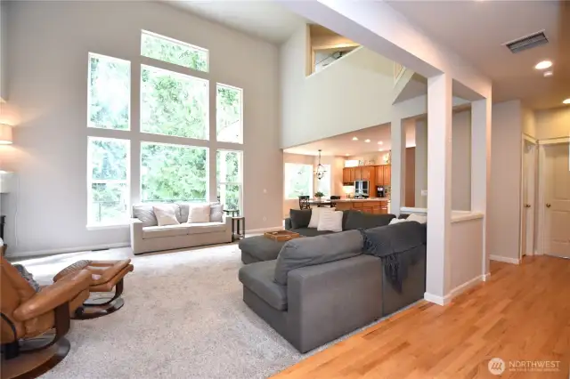Great Room with a Wall of Windows! Adjacent to a greenbelt for a stunning and private view.