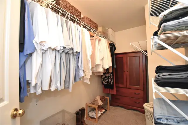 Huge primary walk in closet.