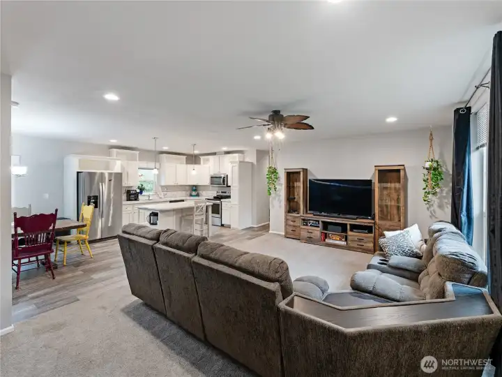 Open concept with recessed lighting and plenty of windows