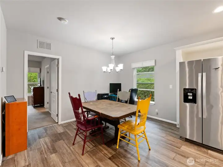 Large dining room with plenty of space for a full sized table for the entire family and friends.
