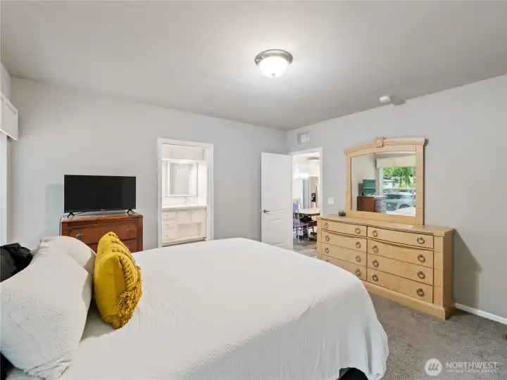 Primary suite separate from the additional bedrooms