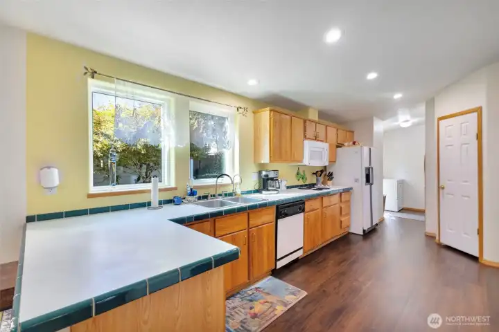 Kitchen with lots of counter space and a walk in pantry.