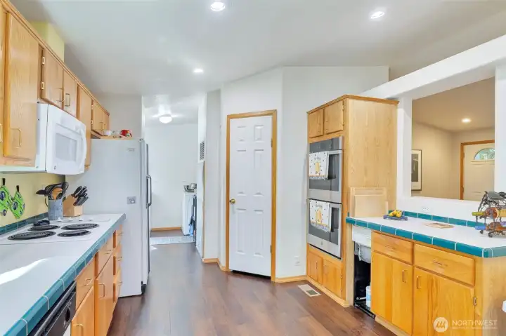 Kitchen with lots of counter space and a walk in pantry.