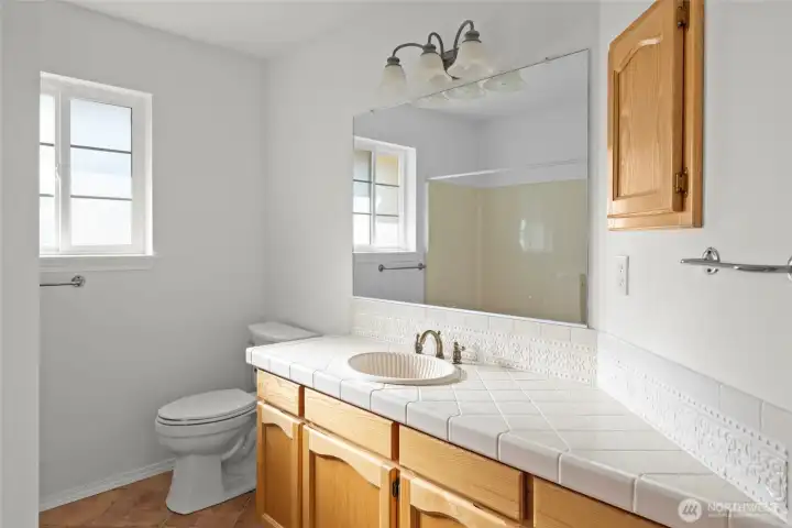 Guest bath with shower over tub