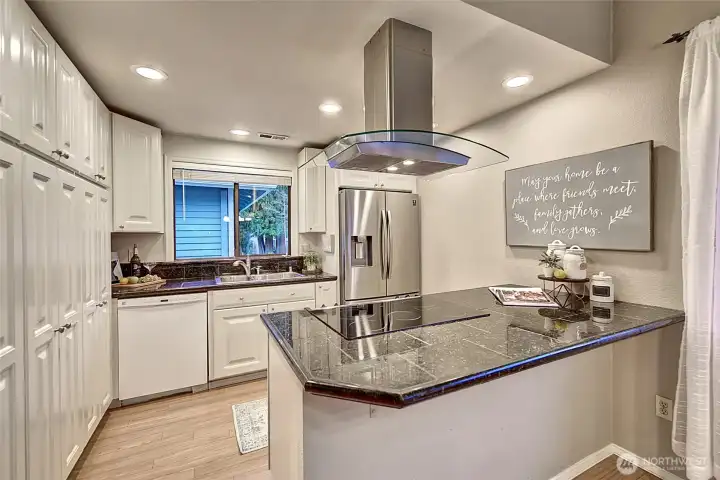 There is room at the peninsula to seat 2-3 stools.