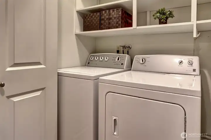 Laundry closet is located in this unit for convenience.