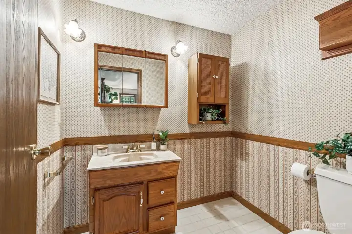 Half bath off of the family room