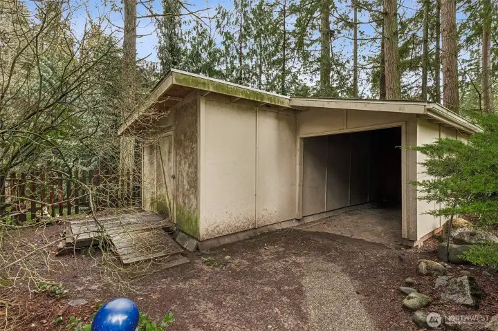 Oversized shed with covered storage