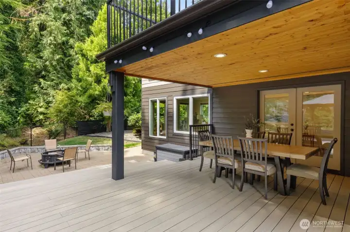 Enjoy large gatherings on this covered deck with dining area!