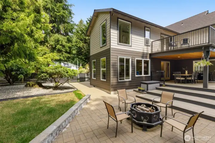 Expansive patio off the deck surrounded by greenbelt everywhere!