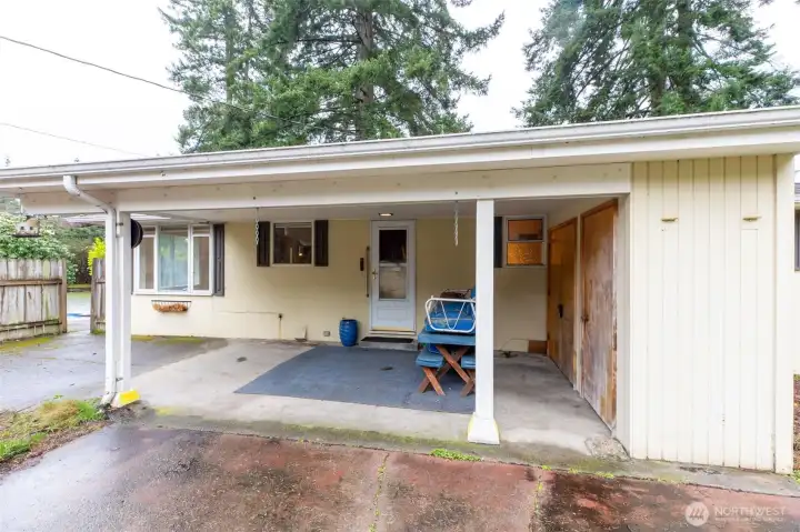 Covered back patio of main home with storage
