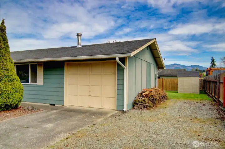 Garage and RV parking on the side.