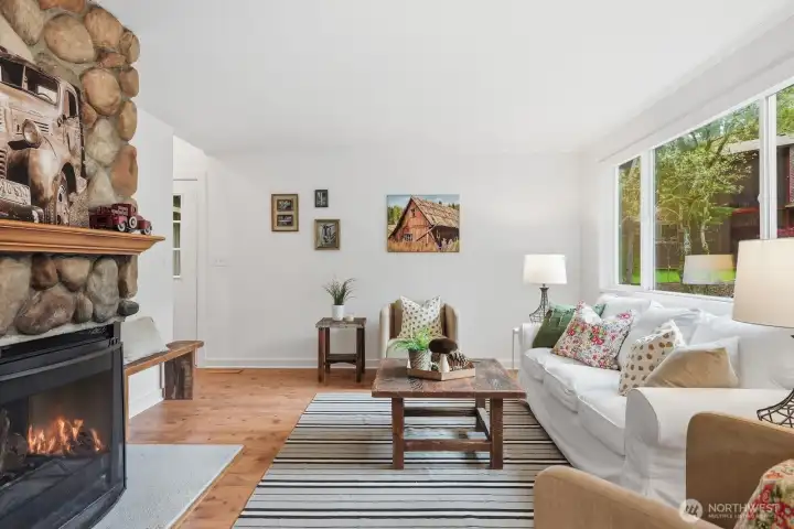 Beautiful, warm wide-plank pine flooring extends throughout the main floor.