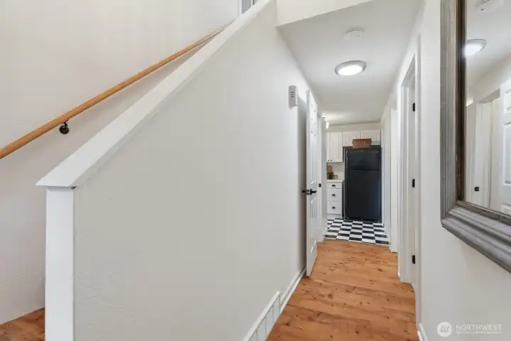 Vaulted ceilings in the entry create a bright, spacious first impression.