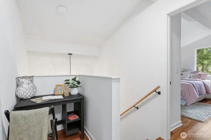 Adorable office nook located off the hallway between two bedrooms, ideal for a home workspace or study area.