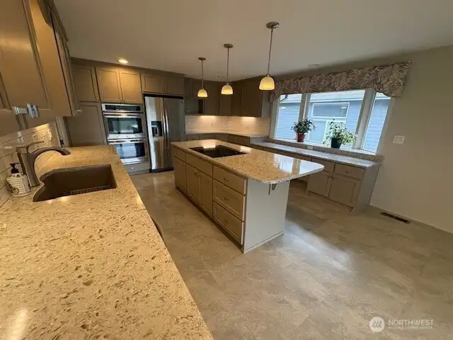 Pendant lights with spacious island