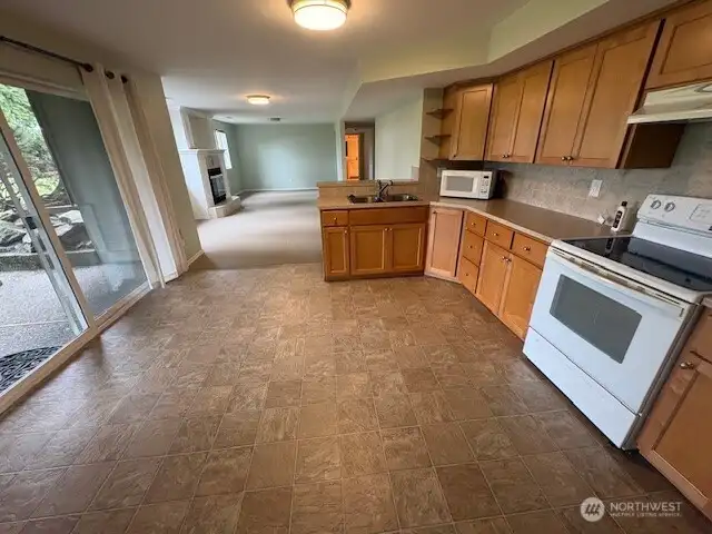Lower level from kitchen looking through to living room