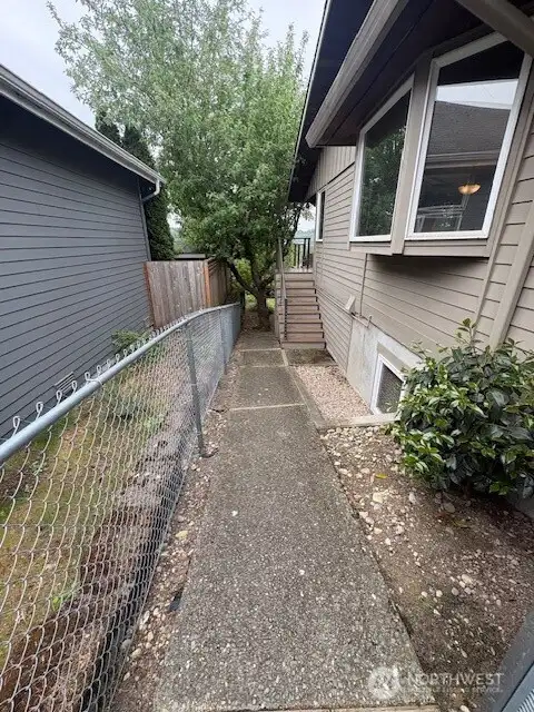 side path to lower level entrance