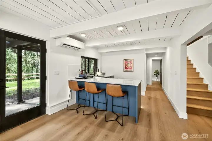 Fantastic full-height, walk-out daylight lower level is the perfect ADU-like space. 2nd kitchen space with breakfast bar Fantastic full-height, walk-out daylight lower level is the perfect ADU-like space. 2nd kitchen space with breakfast bar