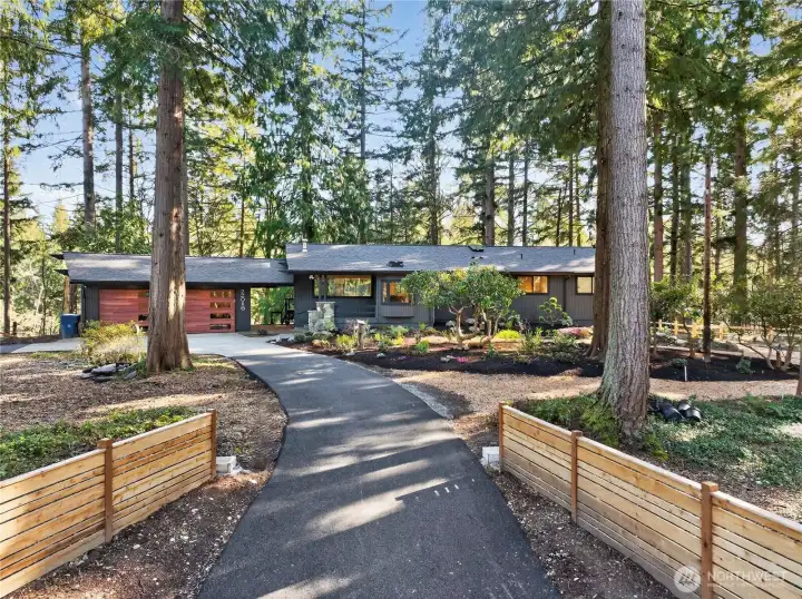 Circular driveway welcomes your guests to this idyllic setting. Note: those 2 low white squares that flank the driveway at the end of the fence entrance - those are future gate post holders with power, and there is a set at each of the 3 driveways. While this magical property feels a world away, you are just 1.5 miles to Whole Foods and countless shopping options in the Alderwood area and Mall, and a quick jaunt to PCC and Canyon Park. Easy proximity to freeway access from this prime spot! Circular driveway welcomes your guests to this idyllic setting. Note: those 2 low white squares that flank the driveway at the end of the fence entrance - those are future gate post holders with power, and there is a set at each of the 3 driveways. While this magical property feels a world away, you are just 1.5 miles to Whole Foods and countless shopping options in the Alderwood area and Mall, and a quick jaunt to PCC and Canyon Park. Easy proximity to freeway access from this prime spot!