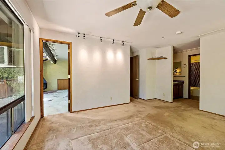 Primary bedroom opens to secret loft area and bath/closet