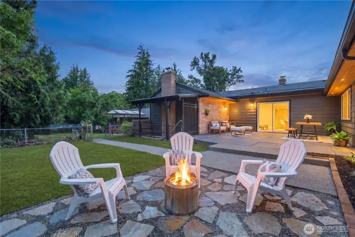 lagstone entertaining area offers the perfect spot for fire pit seating, outdoor lounging, and backyard gatherings.