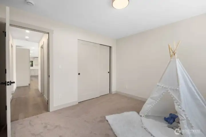 Third bedroom offers comfortable space for a guest room, nursery, playroom, or creative flex space.