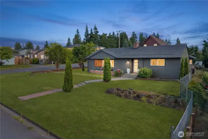 Situated on a large corner lot with excellent yard space, and flexible outdoor use