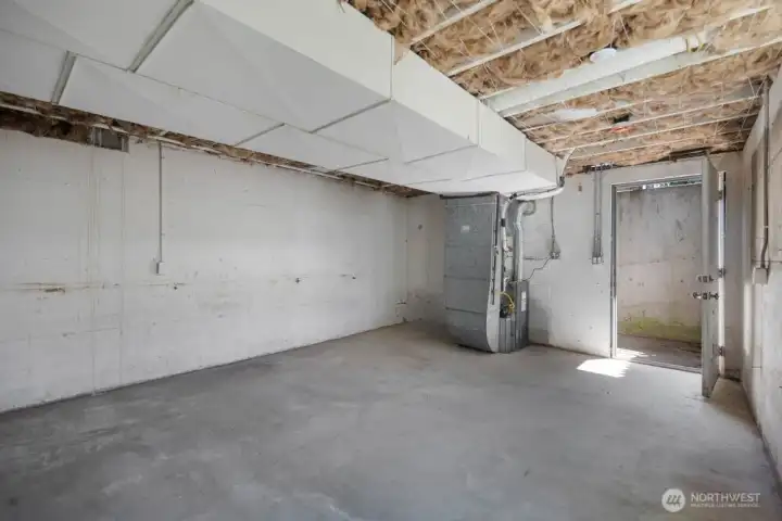 Bonus basement area offers valuable flex space for storage, workshop, hobby room, or home gym.