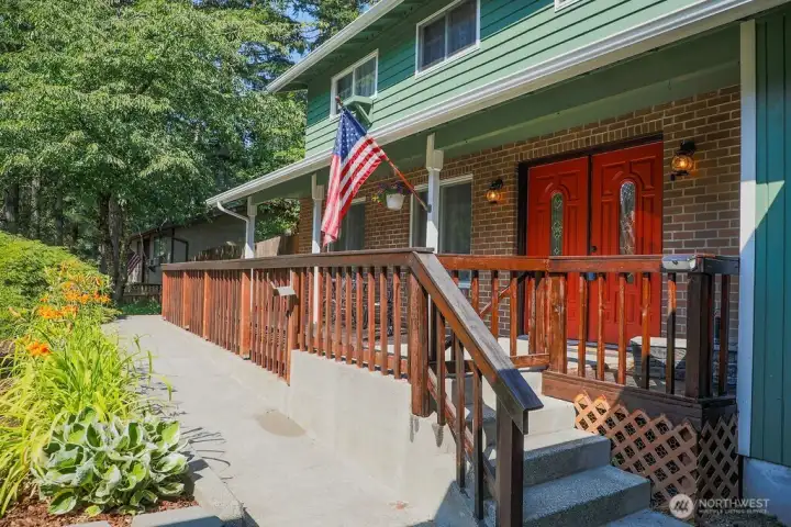 Front of home features a beautiful fiberglass double door and a solid brick facade. Front of home features a beautiful fiberglass double door and a solid brick facade.