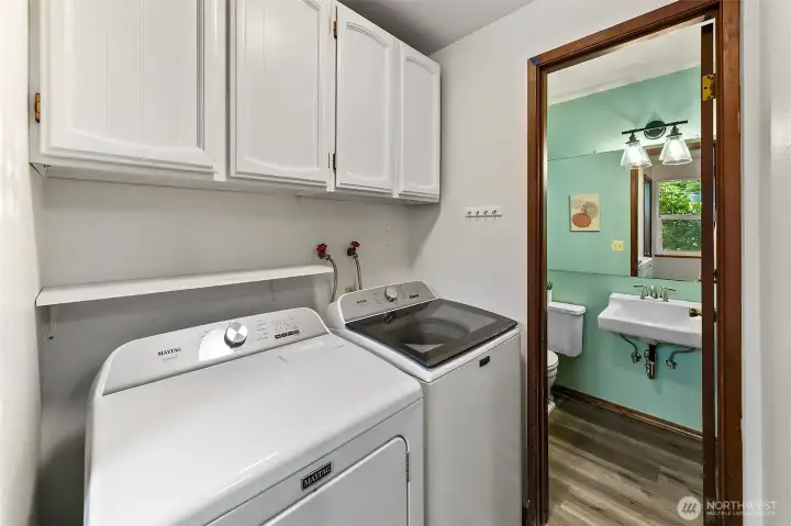 Laundry with adjacent half bath