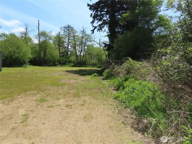 Property off to the right of the carport