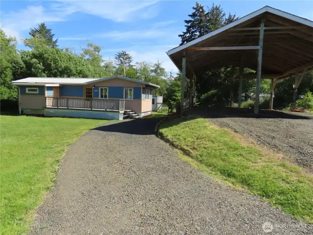 Front Yard with house and Carport