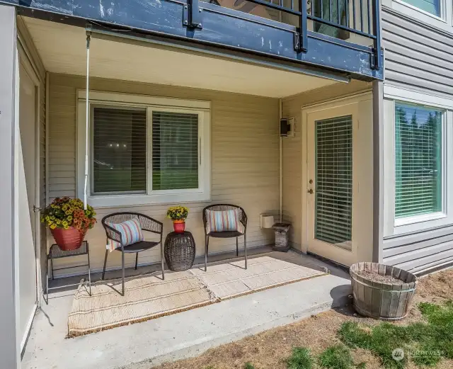 Patio with storage closet adjacent to it.