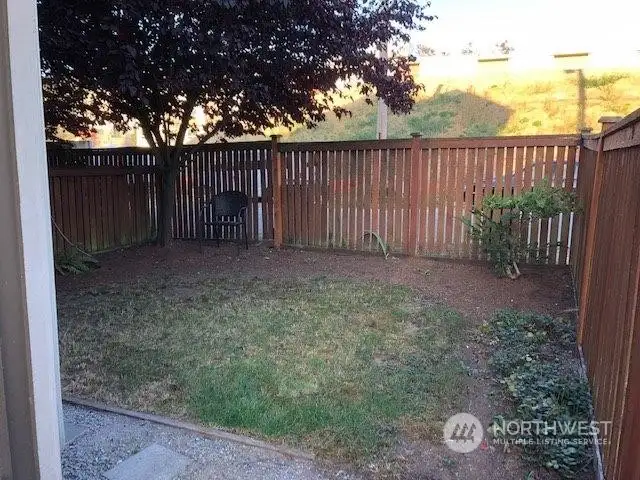 Fully fenced yard ready for your personal touch.