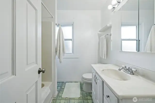 Main floor bathroom, with tub/shower combo