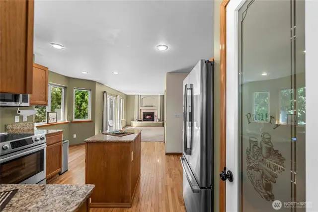 Open kitchen eat in area with access to family room and deck.