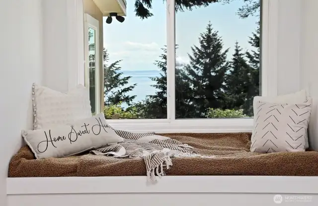 A sweet place to hunker down with a good book or even an afternoon nap. Storage under the bench seat, too!