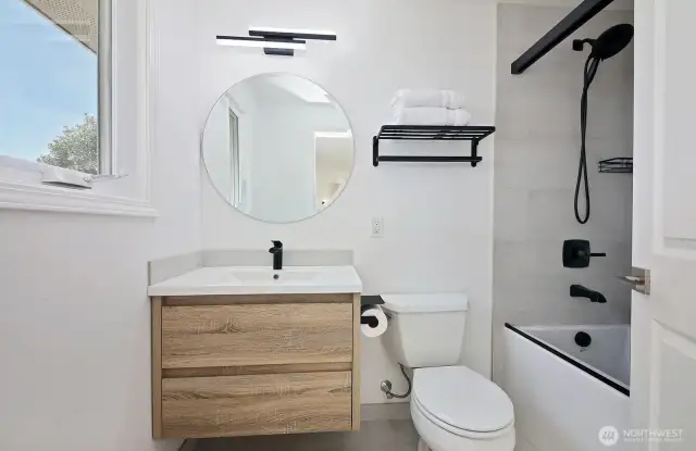 Recently updated bath with a deep soaking tub.
