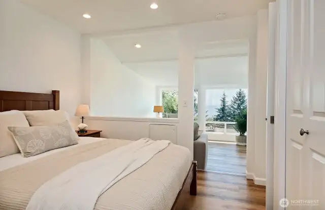 Looking towards the sunroom/sitting area of your Primary Suite. Standard size closet is along the right edge of this photo.