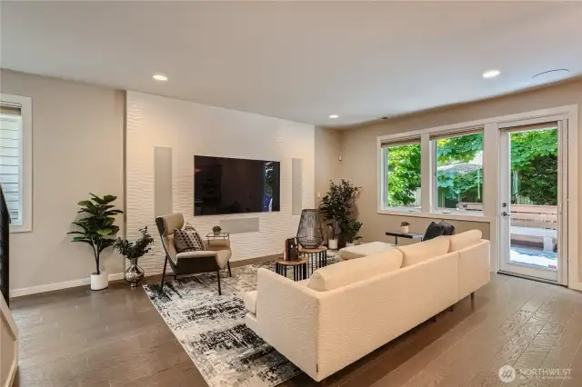 View from kitchen to family room and yard