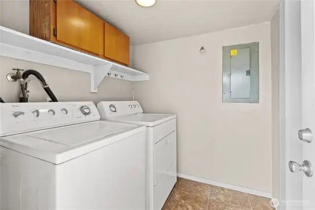 Laundry room and exterior entrance just off the kitchen.  Perfect for bringing groceries in!