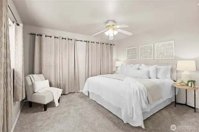 Bedroom 1 is generous in size and features dual closets.  Charming view overlooking your front yard and the Sycamore tree